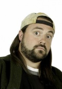 Looked like this, except with snapback cap forward. (This is actually Kevin Smith, aka "Silent Bob.")